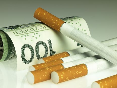 Cigarettes and money. Expensive habit.