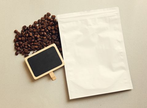 Bag of coffee and blank blackboard with coffee beans, retro filter effect