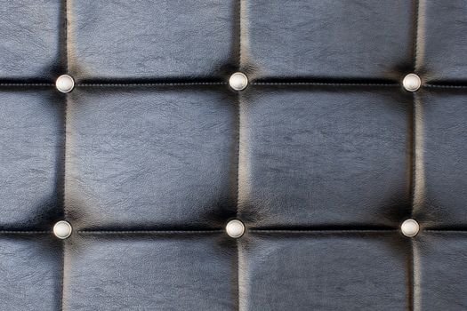 Black upholstery pattern with diamonds