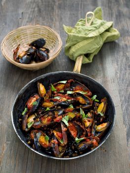 rustic black mussel in tomato sauce