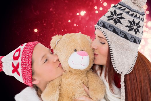 Composite image of mother and daughter kissing teddy