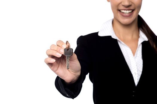 Property agent showing key.