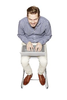 Happy man working on a computer
