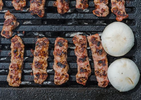Cevapcici and Champignongs on a grill