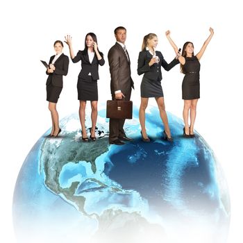 Business people in suits standing on Earth