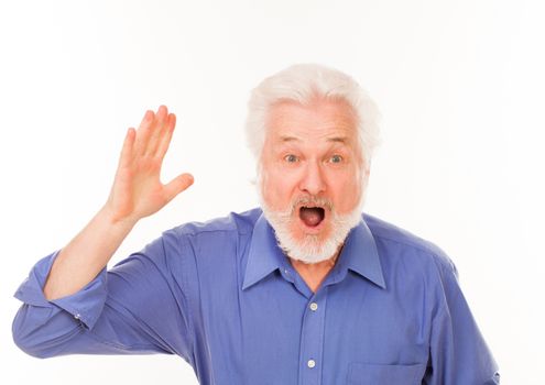 Handsome elderly man with gray beard shouting isolated over white background