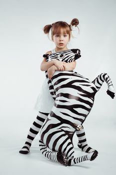 Child with zebra