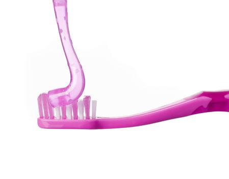 Pink toothbrush isolated on white background
