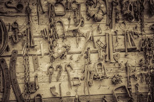 Wall Filled with Old Tools Hanging on the wall