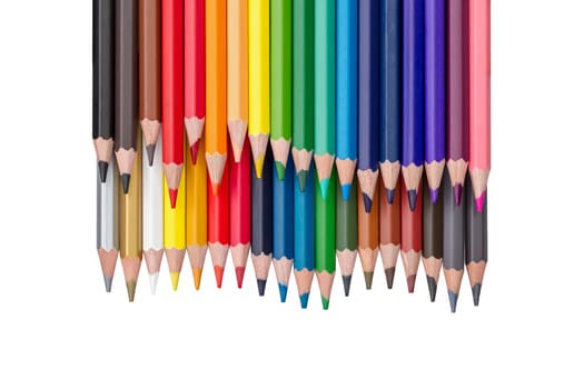 rows of colored pencils isolated on white