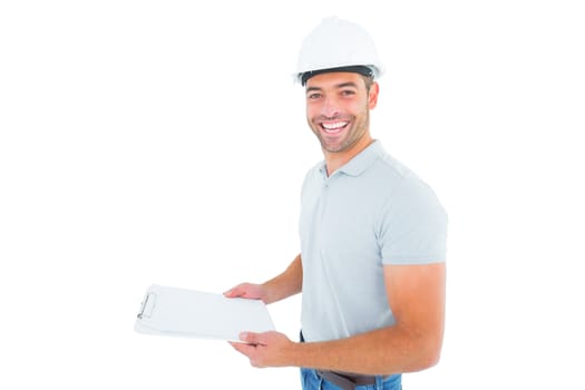 Portrait of manual worker holding clipboard