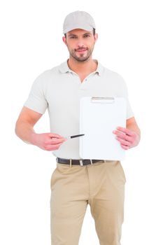 Delivery man giving clipboard for signature