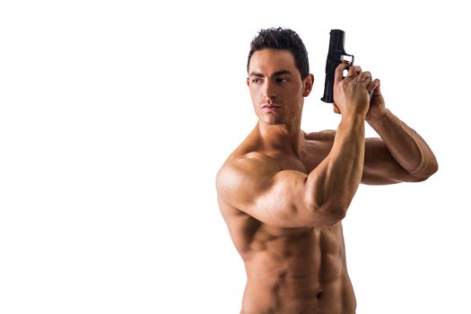 Athletic Topless Man Holding Handgun Against White