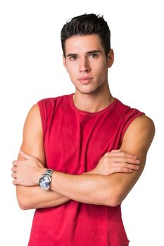 Serious young man looking at camera isolated in white background