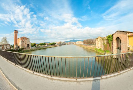 Medieval buildings of Pisa along Arno River - Tuscany, Italy