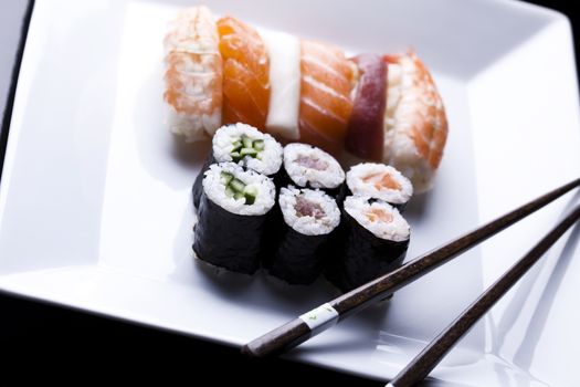 Rolls of sushi, oriental cuisine colorful theme