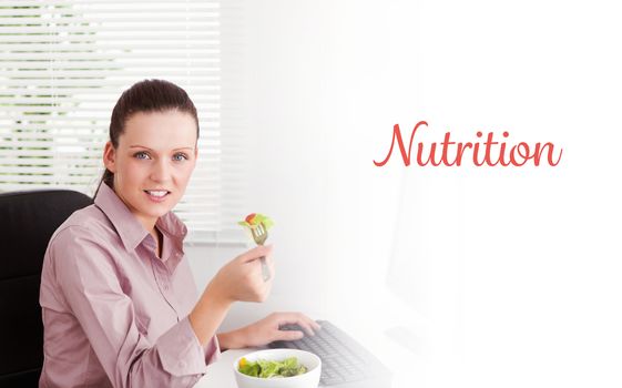 Nutrition against businesswoman eats salad