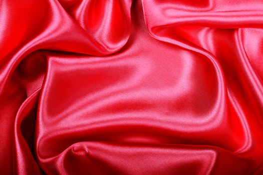 Smooth elegant red silk or satin texture as background 
