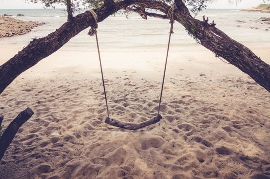 swing on beach vintage