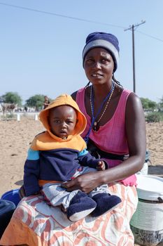 small namibian child with mother