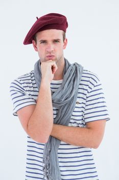 French guy with beret looking at camera 