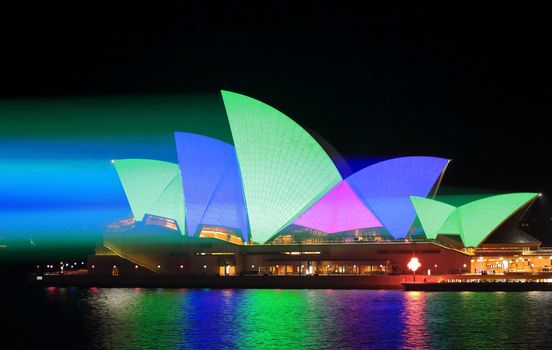 Sydney Opera House shines in green and blue