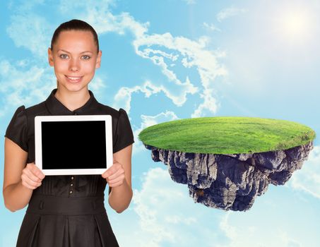 Businesswoman with tablet and island in sky