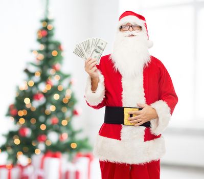 man in costume of santa claus with dollar money