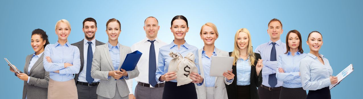 group of happy businesspeople with money bags