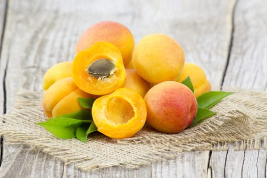 fresh apricots on wooden background