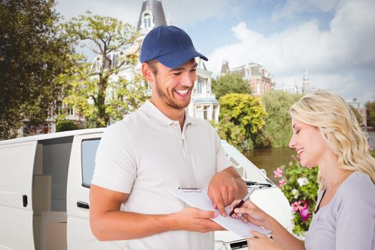 Composite image of happy delivery man getting signature from customer