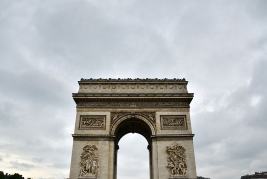 Arc de Triomphe with moody sky