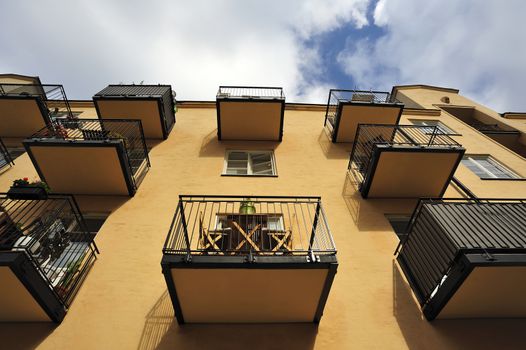 Balconies with blue sky.