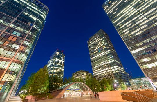 LONDON - JUNE 29, 2015: Canary Wharf skyscrapers at night. Canar