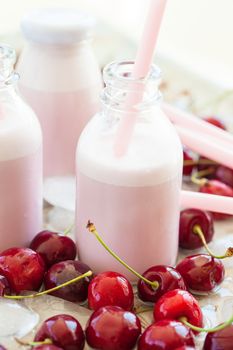 Creamy milk shake with cherries