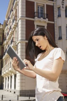 woman watching digital tablet