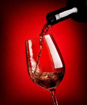 Red wine on red background
