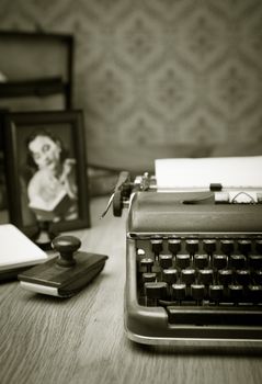 Writing a letter on vintage typewriter