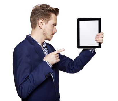 Young man pointing at tablet PC