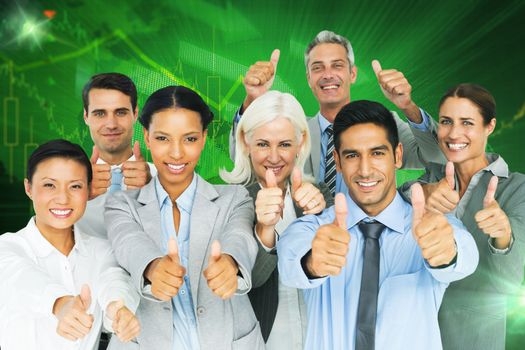 Composite image of happy business people with thumbs up looking at camera 