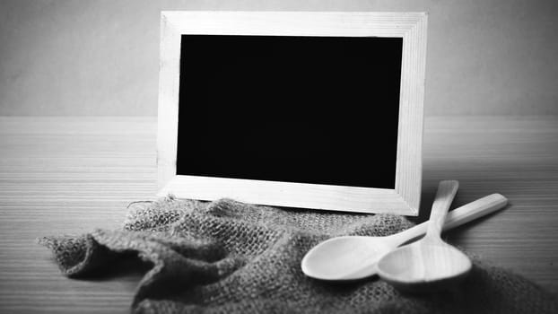 blackboard and wooden spoon black and white color tone style