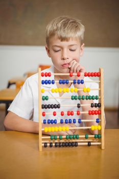 Student using a maths abacus