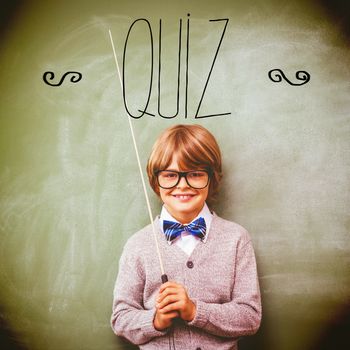 Quiz against portrait of cute little boy holding stick