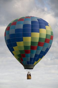 Hot-air Balloon Floating Among Clouds