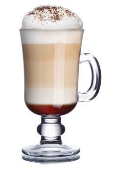 Glass of coffee cocktail with foam decorated with cinnamon powder