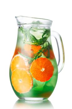 Glass pitchers with tangerine tarragon  (tarkhun) infused detox water