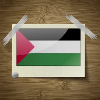 Flags Palestine at frame on wooden texture. Vector