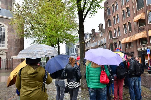 Amsterdam, Netherlands - May 16, 2015: People queuing at the Anne Frank house and holocaust museum in Amsterdam