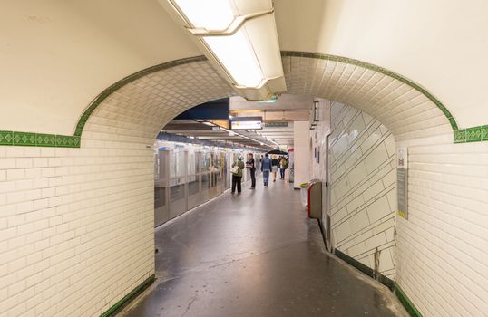 PARIS - JUNE 10, 2014: Interior of subway station. Metro trains 