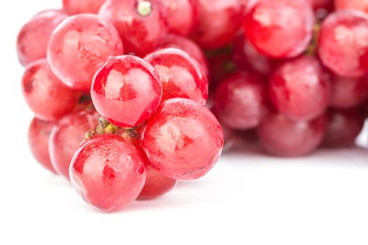 bunch of red soak grape on white background